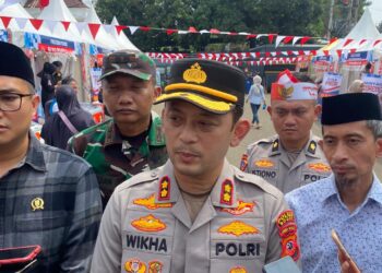 Sambut HUT RI ke-80, Polres Bogor Bagi Sembako Murah, Sayuran dan Layanan Kesehatan Gratis