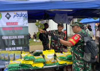 Koramil 0621-05 Gunung Putri Salurkan 2 Ton Beras di Stand GPM pada Karnaval Desa Telajung Udik