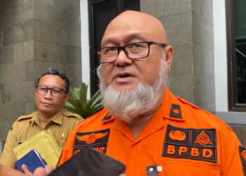 Kepala Pelaksana BPBD Kabupaten Bogor Ade Hasrat saat memaparkan data statistik bencana sepanjang tahun 2025.