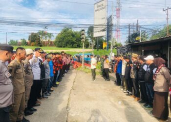 Kapolsek Dramaga IPTU Desi Triana memimpin apel pengamanan malam Natal 2025 di Jalan Lingkar Dramaga