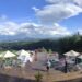 Area glamping dan wahana di Wisata Alam Sevillage dengan latar belakang pegunungan Puncak.