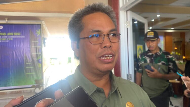 Kepala DPMD Kabupaten Bogor Hadijana saat memberikan penjelasan terkait publikasi anggaran desa